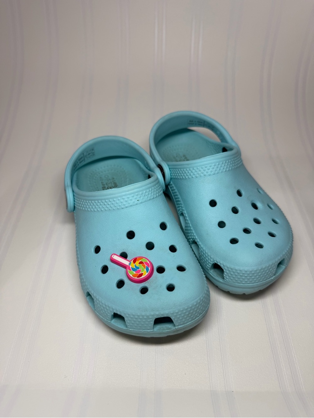 CROCS Kids Light Blue Closed-Toe Clogs with Lollipop Charm